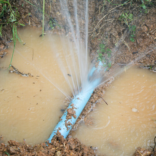 water spewing from a pipe